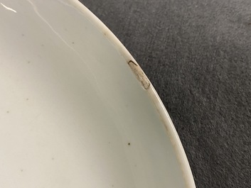 A Chinese famille rose dish with a lady in a landscape, Yongzheng